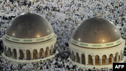 Pilgrims performed evening prayers in Mecca's Grand Mosque on October 8, as more than 2 million Muslims converged on the holy city for the annual hajj pilgrimage.