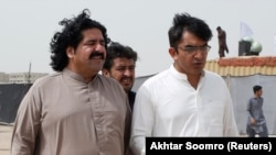 FILE: Ali Wazir (L) and Mohsin Dawar, leaders of the Pashtun Tahafuz Movement (PTM).