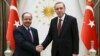 Turkish President Recep Tayyip Erdogan (right) meets with Iraqi Kurdish regional President Masud Barzani at the Presidential Palace in Ankara on December 9.