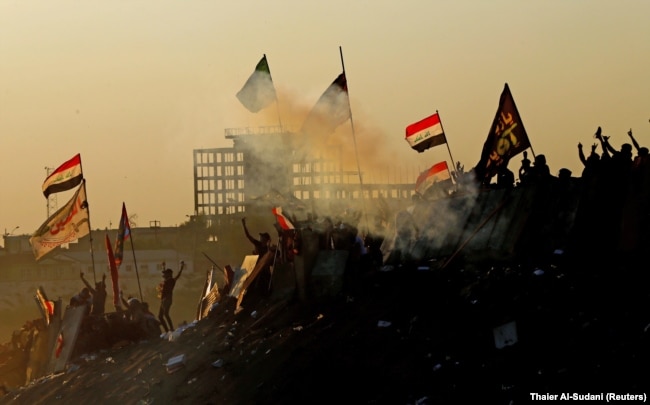 Iraqi demonstrators at an anti-government protest in Baghdad, November 1, 2019