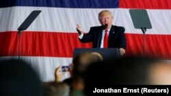 U.S. President Donald Trump delivers remarks to U.S. troops at the Sigonella Naval Air Station in Sicily.