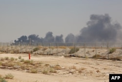 Smoke billows from a Saudi Arabian oil facility following a drone attack in September 2019.