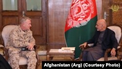 FILE: General Kenneth McKenzie, the head of U.S. Central Command meeting Afghan President Ashraf Ghani in Kabul.