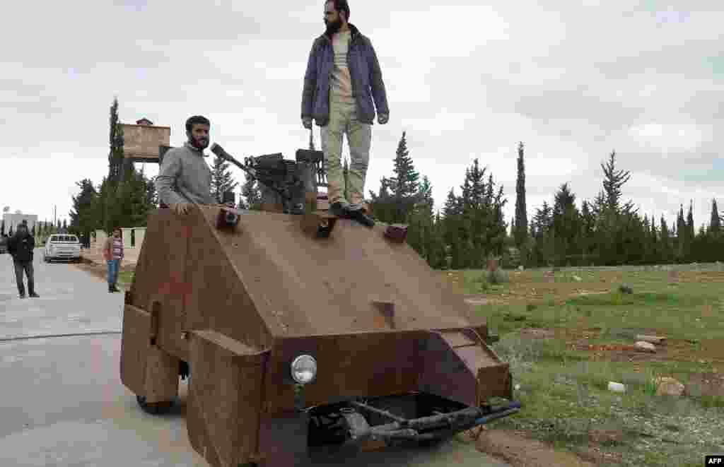 From a distance, it looks rather like a big rusty metal box. Closer inspection reveals the latest achievement of the Syrian rebels: A homemade armored vehicle waiting to be deployed. Sham II, named after ancient Syria, is built from the chassis of a car and touted by rebels as &quot;100 percent made in Syria.&quot;