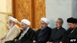 (R-L) Hassan Khomeini, grandson of Ayatollah Ruhollah Khomeini, Parliament Speaker Ali Larijani, Iranian President Hasan Rouhani, Judiciary Chief Sadegh Larijani and Iran's head of the Assembly of Experts.