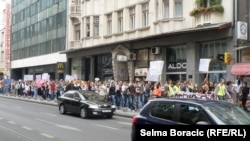 Bosnians protest the lack of a law on social-security numbers for newborns in Sarajevo on June 10.