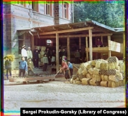 Workers prepare bottles of Borjomi's fizzy, slightly salty mineral water for transport.