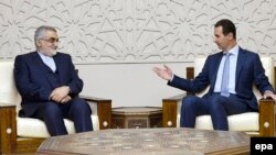 Syrian President Bashar al-Assad (R) meets with Alaeddin Boroujerdi, the head of the Iranian parliament's National Security and Foreign Comittee, in Damascus, January 4, 2017