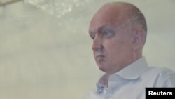 Оппозициялық саясаткер Владимир Козлов сотта отыр. Ақтау, 16 тамыз 2012 жыл.