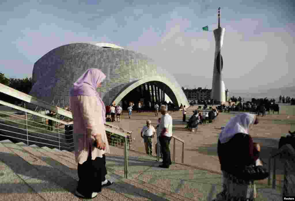 The faithful walk near a new mosque in the Croatian city of Rijeka. The mosque is being called one of the most beautiful in Europe. It cost an estimated 10 million euros ($13.1 million) to construct. This is the first mosque built in the Croatian Adriatic city since the withdrawal of the Ottoman Empire and is the third in Croatia, in addition to others in Zagreb and Gunji. (Reuters/Antonio Bronic) 