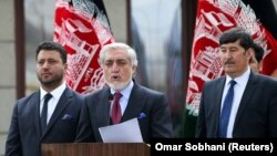 د عبدالله عبدالله په مشرۍ د 'ثبات او همپالنې' انتخاباتي ټيم. انځور ارشیف