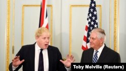 U.S. Secretary of State Rex Tillerson and British Foreign Secretary Boris Johnson attend a press conference in London, January 22, 2018
