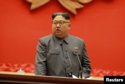 Ким Чен Ын на одной из партийных конференций в Пхеньяне
