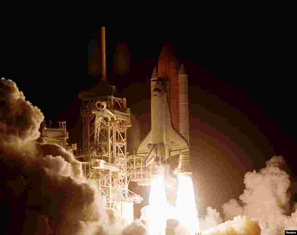 The space shuttle &quot;Endeavour&quot; lifts off from the Kennedy Space Center early in the morning of December 4, 1998. The crew was successful in their second attempt to begin Mission STS-88, the first U.S. flight for assembly of the International Space Station carrying the &quot;Unity&quot; module. That module would later pair up with the &quot;Zarya&quot; to form the first functional segment of the ISS. 