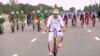 Turkmen President Gurbanguly Berdymukhammedov rides his bike in Ashgabat on June 1 as part of a mass ride that set a Guinness world record.