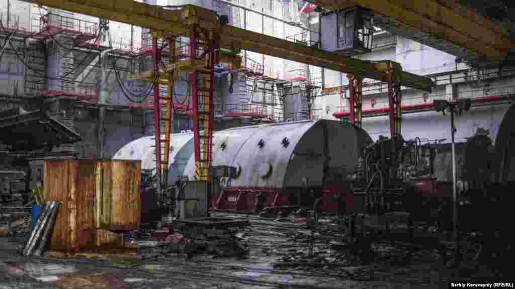 A giant turbine in Chernobyl's Unit 4. A nuclear reactor is like a giant steam engine. Uranium fuel rods react to produce a massive amount of heat. That converts water into steam which drives the turbines to generate electricity.