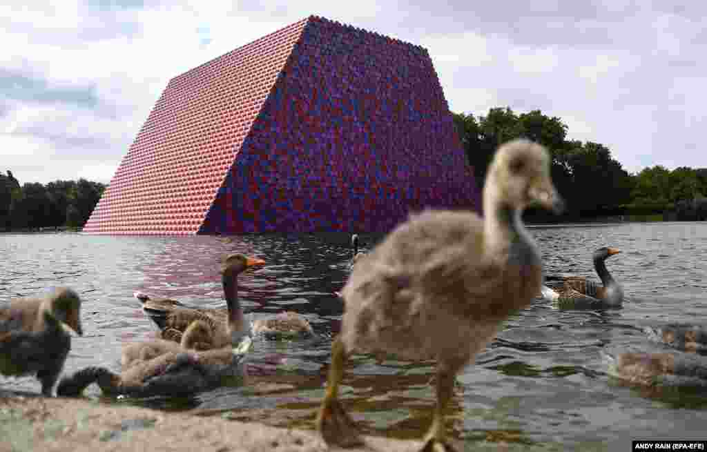 A view of Mastaba by Christo, built on The Serpentine in London in June 2018. The enormous floating structure reached more than 20 meters in height and comprised 7,506 horizontally stacked barrels. It was Christo&#39;s first major public outdoor work in Britain.&nbsp;