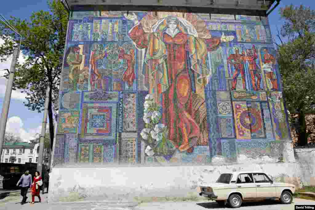 A mosaic celebrating the achievements (chiefly cotton) and exoticism of Soviet Tajikistan.