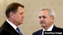 România - Președintele României, Klaus Iohannis (stânga) și fostul președinte al PSD, Liviu Dragnea, acum în închisoare