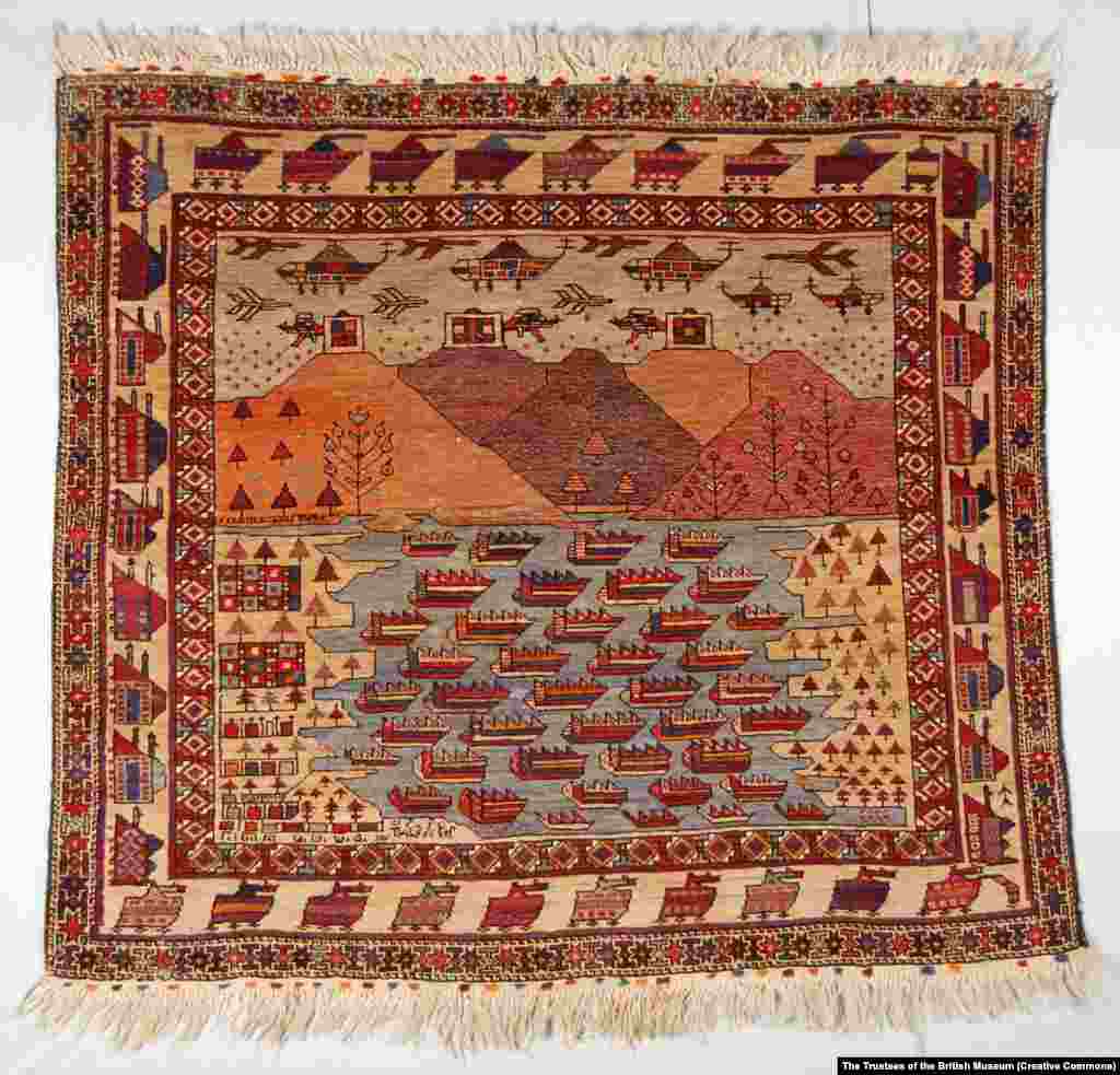 A lake filled with boats lies beneath a sky full of warplanes and helicopters in this beach-towel-sized rug. The carpet was made in Afghanistan soon after the 1979 Soviet invasion of the country.