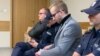 Міхал Прокопович (у сірому піджаку) на засіданні суду, Краків, 14 січня 2019 року