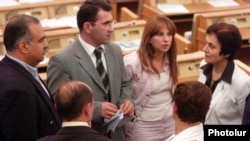 Armenia - Zaruhi Postanjian (C) and other deputies from the opposition Zharangutyun party talk in parliament.