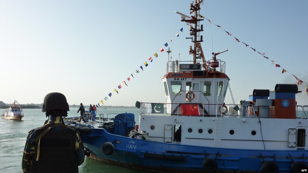 FILE: Pakistani soldiers stand guard at the port of Gwadar in the southwestern province of Balochistan.