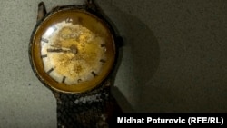 A tarnished wristwatch is one of hundreds of mementos donated by relatives of the victims of the genocide at Srebrenica.