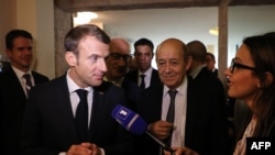 Macron says it's unclear who in Iran ordered French bomb plot