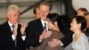 Former President Bill Clinton (left) and Vice President Al Gore greet freed journalists Laura Ling and Euna Lee (right) upon their arrival in the United States.