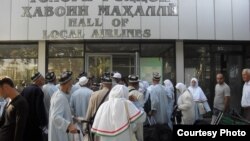 Қажылық сапарына шыққан Тәжікстан азаматтары (Көрнекі сурет).