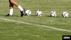 Iran-An Iranian football player is training with ball,2007