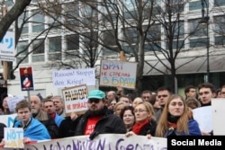 Алексей Козлов (в центре) на одной из акций протеста в Германии