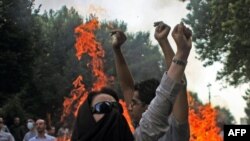 An Iranian female protester during a July 2009 opposition rally in Tehran