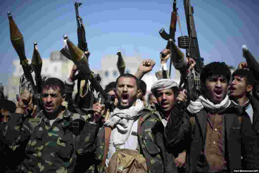 Yemeni tribesmen loyal to Huthi rebels brandished their weapons in 2016. The Iran-backed rebels, who control the capital Sanaa, called for &quot;swift reprisals&quot; for the killing of Soleimani.