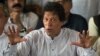 FILE: Imran Khan gestures as he addresses members of the media in July, 2017.