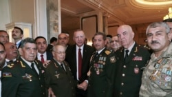 Azerbaijan -- Turkish President Recep Tayyip Erdogan, center, poses for photos with Azeri and Turkish army commanders during a summit of Turkic states in Baku, October 15, 2019.