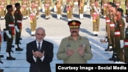 Afghan President Ashraf Ghani (left) and Pakistani army chief General Raheel Sharif (file photo, click to enlarge)