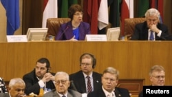 EU foreign-policy chief Catherine Ashton (top left) speaks during the joint Arab League-European Union foreign ministers meeting on Syria, at the Arab League headquarters in Cairo on November 13.
