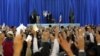 Iranian Supreme Leader Ayatollah Ali Khamenei waves to the crowd before addressing thousands of people for Norouz in the the holy city of Mashhad on March 21.