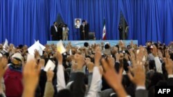 Iranian Supreme Leader Ayatollah Ali Khamenei waves to the crowd before addressing thousands of people for Norouz in the the holy city of Mashhad on March 21.