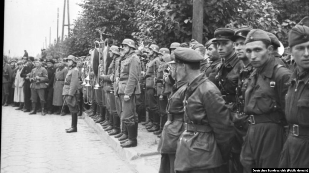 German and Red Army soldiers attend parade in Brest following the invasion of Poland in September 1939.