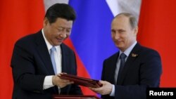 Kineski predsednik Xi Jinping i prvi čovek Rusije Vladimir Putin