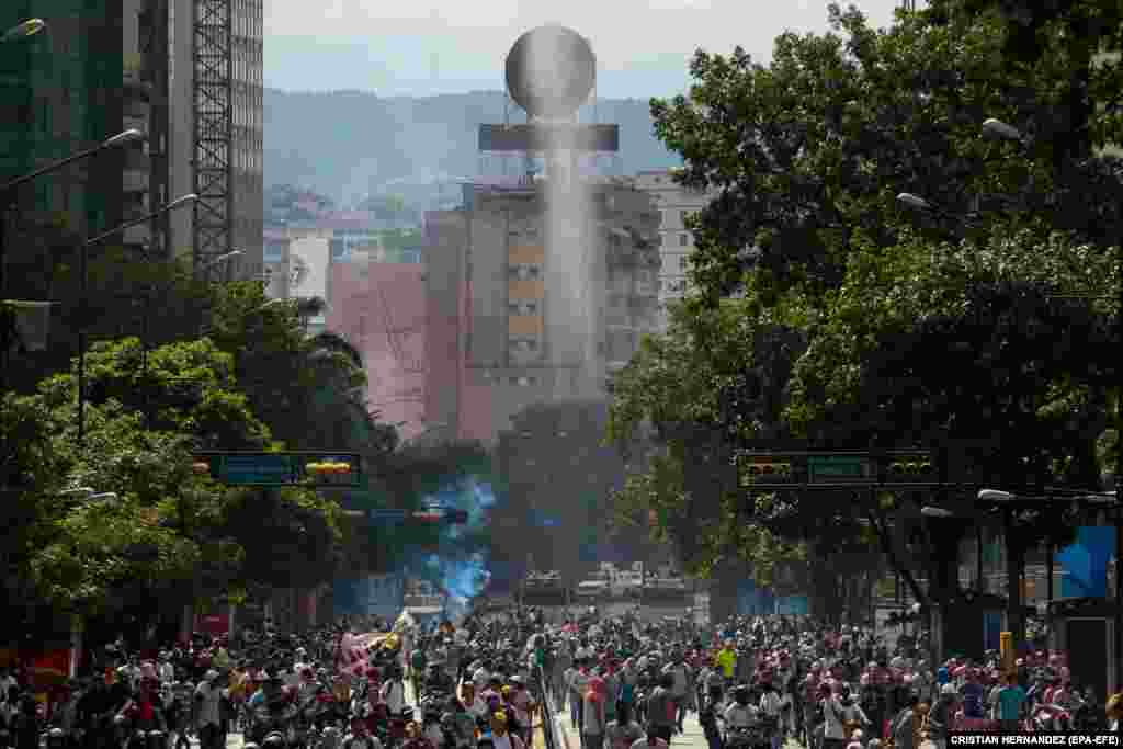 Demonstrators take to the streets of Caracas after members of the opposition called for people to ignore the legitimacy of Maduro's second term. Along with charges of election fraud, Maduro has been criticized for his handling of Venezuela's collapsing economy and for alleged human rights abuses. 