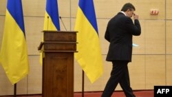 Фото з однієї з прес-конференцій Віктора Януковича після втечі в Росію