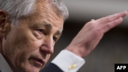 Former U.S. Senator Chuck Hagel was approved by the slimmest margin ever to pass a nominee for the post of defense secretary.