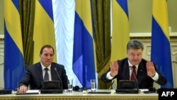 Архивное фото: Стефан Левен и Петр Порошенко в Киеве, 11 марта 2015 года