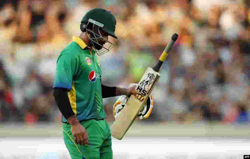 New Zealand -- Mohammad Hafeez of Pakistan is dismissed for 61 runs during the second 20/20 cricket match between New Zealand and Pakistan at Eden Park in Auckland, January 15, 2016