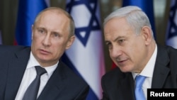 Israeli Prime Minister Benjamin Netanyahu (right) and Russian President Vladimir Putin (file photo)