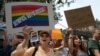 Protesters hold a demonstration against Russian antigay legislation and against the Russian president's stand on gay rights in front of the Russian Consulate in New York on July 31.